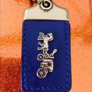 Coach 1941 purple hang tag